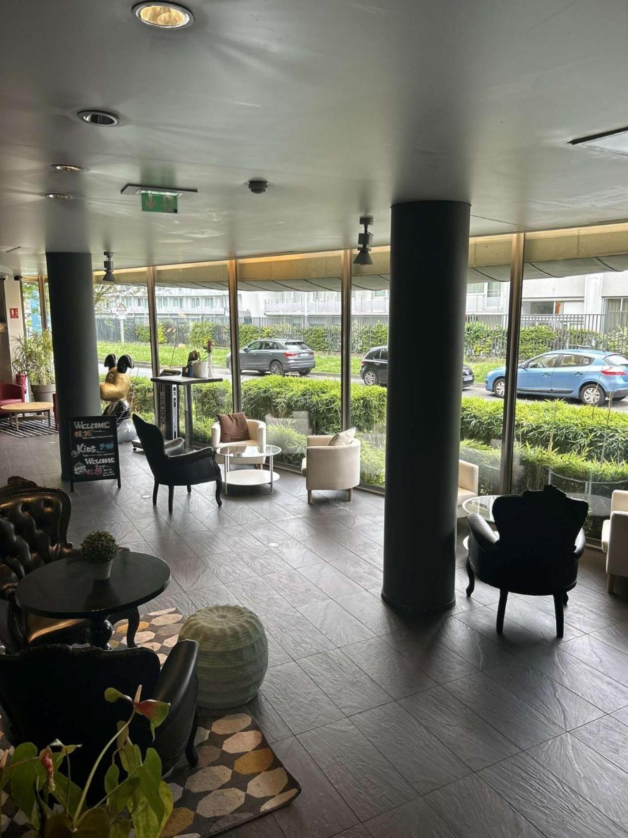 Standing Hotel Suites By Actisource Roissy-en-France Zewnętrze zdjęcie